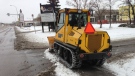 Snow plows were deployed Saturday to clear sidewalks and streets after a snowstorm hit Winnipeg Friday night.