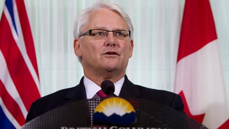 British Columbia Premier Gordon Campbell pauses for a moment as he addresses a news conference in downtown Vancouver, Wednesday, Nov 3, 2010. Premier Campbell announced that he will resign as premier. THE CANADIAN PRESS/Jonathan Hayward