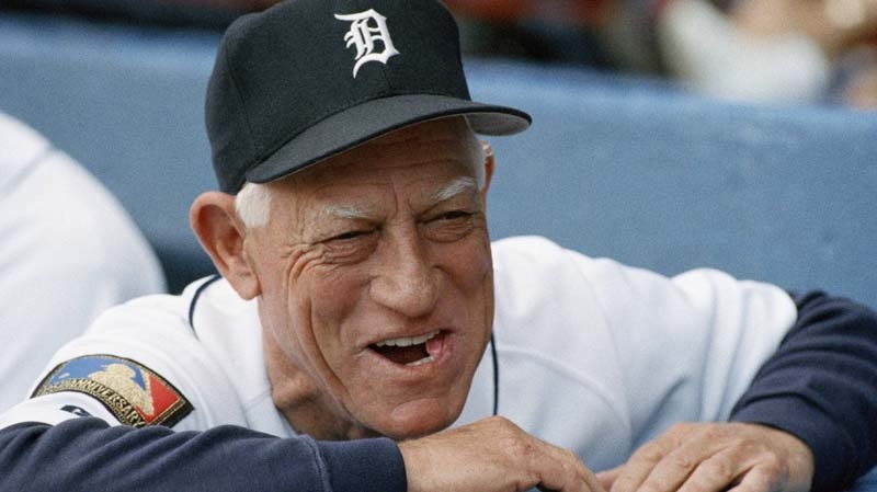 This July 26, 1994, file photo shows Detroit Tigers manager Sparky Anderson smiling as he looks out from the dugout prior to the start of a baseball game against the Seattle Mariners, in Detroit. Anderson died Thursday, Nov. 4, 2010 in Thousand Oaks, Calif. He was 76. (AP Photo/Lennox McLendon, File)