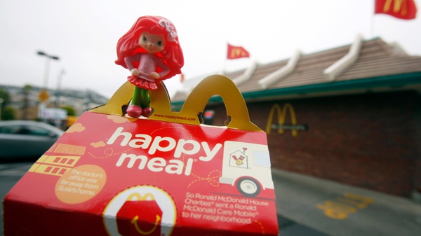 A Happy Meal box and toy are shown outside of a McDonald's restaurant in San Francisco. (AP / Jeff Chiu)