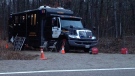 Ontario Provincial Police set up a command post as they investigate human remains found in a wooded area near Calabogie on Nov. 11, 2012.
