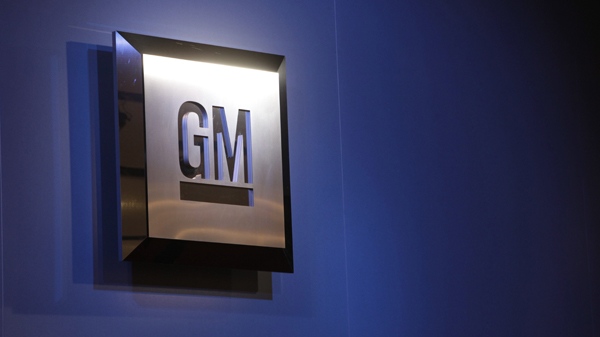A General Motors sign is shown at the North American International Auto Show in Detroit. (AP / Paul Sancya)
