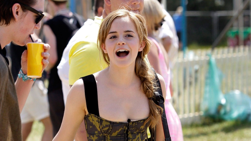 Emma Watson walks through Glastonbury Festival, in Glastonbury, England, Friday, June 25, 2010. The Festival celebrates its 40th anniversary this year. (AP / joel Ryan)