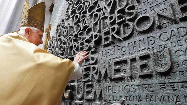 Pope Benedict XVI blesses the gate of the Sagrada Familia during a mass in Barcelona, Spain, Sunday, Nov. 7, 2010. (AP / Andres Ballesteros)