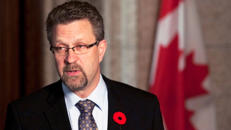 Minister of Transport, Infrastructure and Communities Chuck Strahl speaks to media in the Foyer of the House of Commons on Parliament Hill in Ottawa on Monday Nov. 8, 2010. (Sean Kilpatrick / THE CANADIAN PRESS)