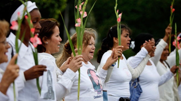 Laura Pollan, leader the Cuban dissident group Ladies in White, center, demonstrates during the group's weekly march in Havana, Cuba, Sunday Nov. 7, 2010. (AP / Javier Galeano)