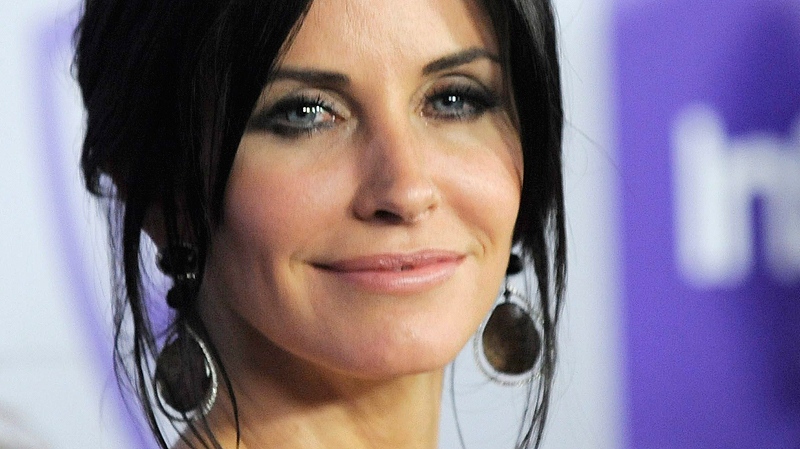 Courteney Cox arrives to the InStyle/Warner Bros. party following the 67th Annual Golden Globe Awards on Sunday, Jan. 17, 2010, in Beverly Hills, Calif. (AP / Chris Pizzello)