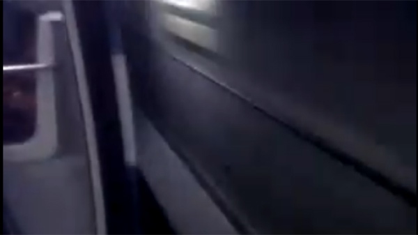 This frame taken from a Youtube video shows a metro car running on the green line with the doors open. (Nov. 9, 2010)