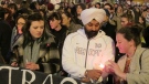 An Indian man and Irish woman light candles as abortion rights protesters march through central Dublin Saturday, Nov. 17, 2012. (AP / Shawn Pogatchnik)