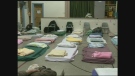 Beds set up for the Out of the Cold program in Waterloo