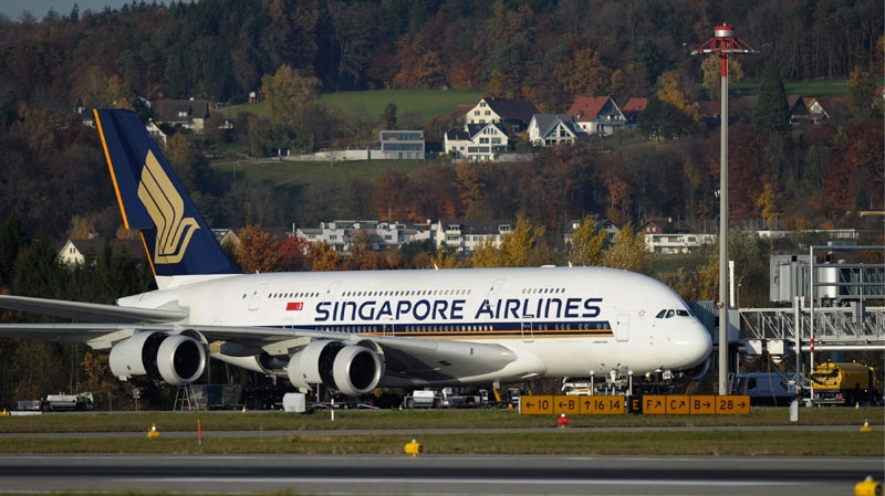 A Singapore Airlines Airbus A-380 has its engine checked, at the Airport Zuerich, in Switzerland, in this Nov. 4, 2010 file photo. (AP / Keystone, Steffen Schmidt, File)