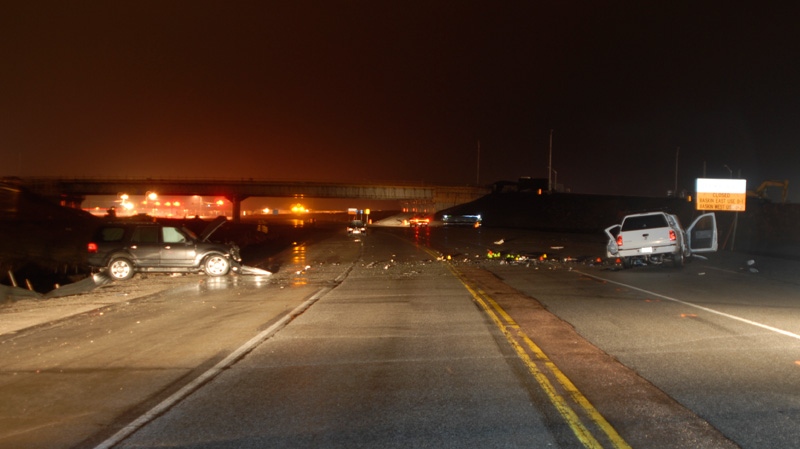 Pictures released to the court show the scene of a crash between a black Ford Expedition and white pick-up truck on Highway 17 Thursday, March 31, 2011.