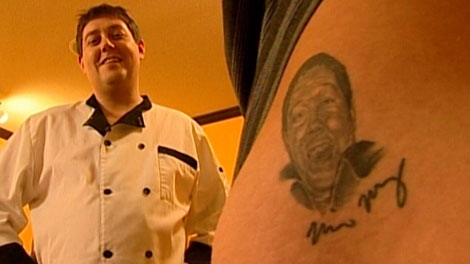 Dustin Thut had his boss's face tattooed on his rear end to get a raise at work. Nov. 11, 2010. (A Channel)