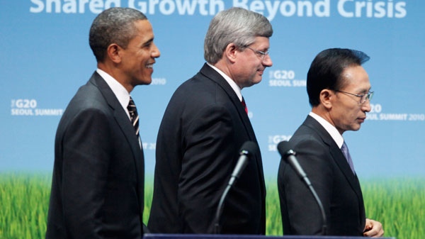 From left: U.S. President Barack Obama, Prime Minister Stephen Harper and South Korean President Lee Myung-bak attend G20 SME Finance Challenge Award winners ceremony at the G20 summit in Seoul, South Korea, Friday, Nov. 12, 2010. (AP / Pablo Martinez Monsivais)