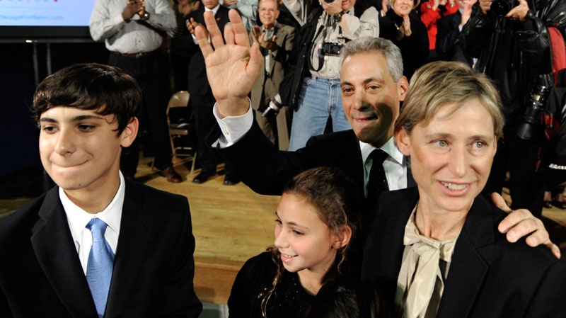 Rahm Emanuel, along with wife Amy right, and children Zach right, and Ilana, middle, after announcing his candidacy for Mayor of Chicago at the John C. Coonley School in Chicago, Saturday, Nov. 13, 2010. (AP / Paul Beaty)