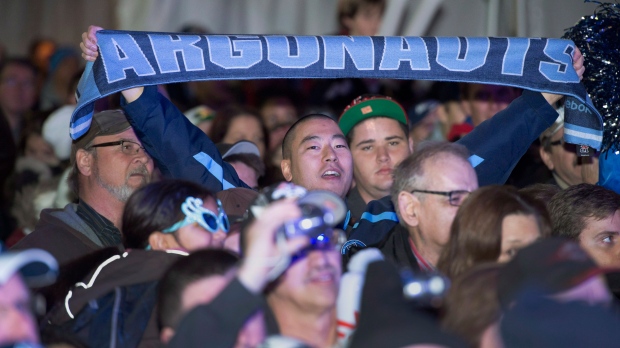 Toronto Argonauts fans cheer at a pep rally in Toronto on Tuesday November 20, 2012. (Frank Gunn / THE CANADIAN PRESS)