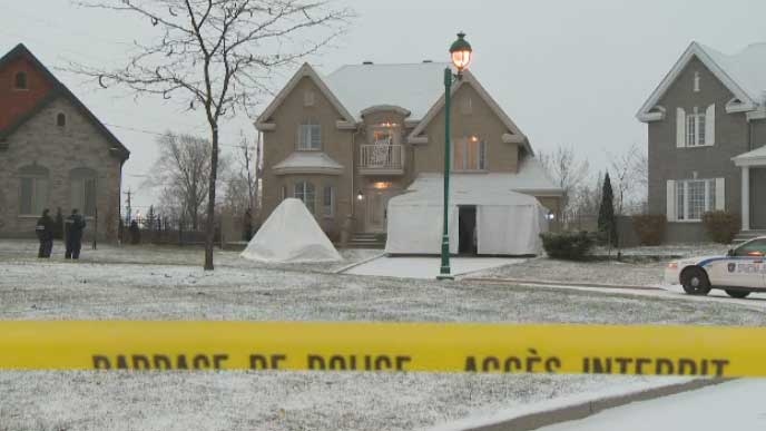 The scene outside a home invasion early Monday morning in Chateauguay.