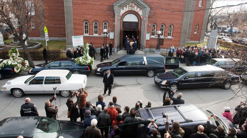 The casket of Nicolo Rizzuto is carried into the church for funeral services for the reputed organized crime boss Monday, Nov. 15, 2010. (Ryan Remiorz / THE CANADIAN PRESS)