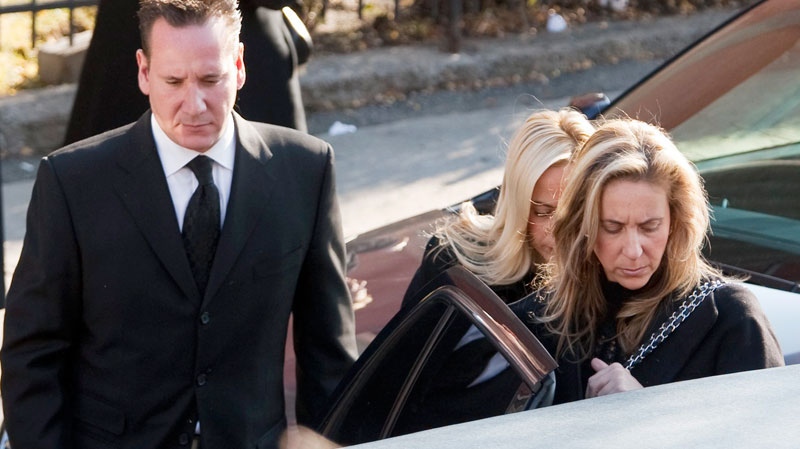 Leonardo Rizzuto, left, and his sister Bettina Rizzuto, right, leave after a funeral service for their grandfather, reputed organized crime boss Nicolo Rizzuto, in Montreal, Monday, November 15, 2010. (Ryan Remiorz / THE CANADIAN PRESS)
