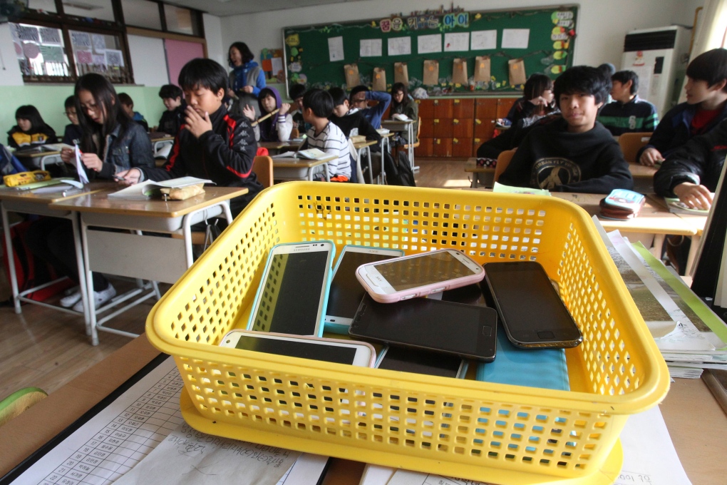 Smartphones in plastic basket South Korea