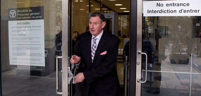 Ken Coran, president of the Ontario Secondary School Teachers' Federation, leaves the Ontario Superior Court of Justice with fellow union leaders, in Toronto on Thursday, Oct. 11, 2012. (The Canadian Press/Chris Young)