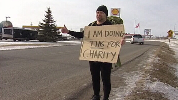 The 'Gitchhiker' is crossing the country in 21 days hoping to raise money for the Canadian Cancer Society.