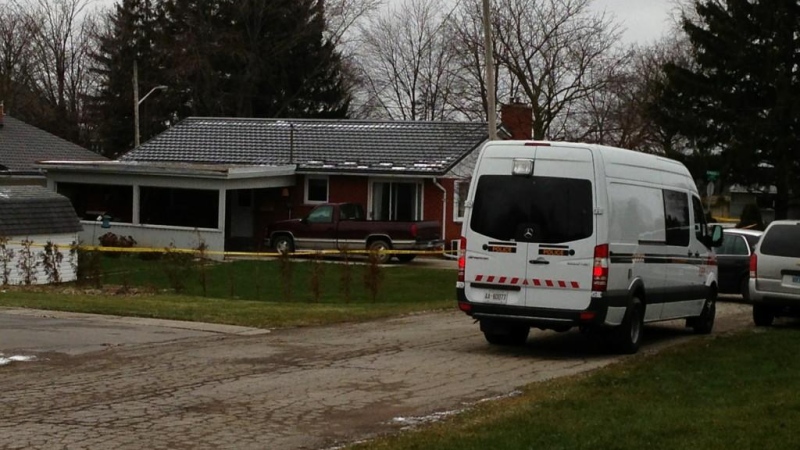 Investigators work at the scene of a fatal shooting in Milverton, Ont. on Wednesday, Dec. 5, 2012. (Gerry Dewan / CTV London)