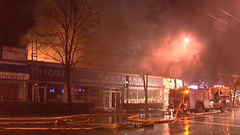 The Parthenon Supermarket in Kitsilano burns in a 1998 fire. (CTV)