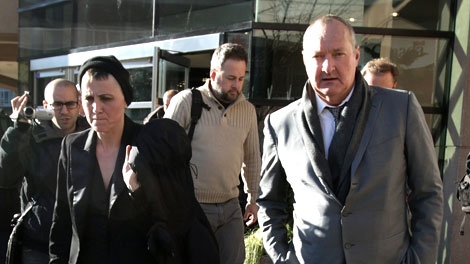 Actor Randy Quaid, right, is accompanied by his wife Evi, left, as he leaves a Canadian Immigration and Refugee Board hearing in Vancouver, B.C., on Tuesday November 23, 2010. (Darryl Dyck / THE CANADIAN PRESS)