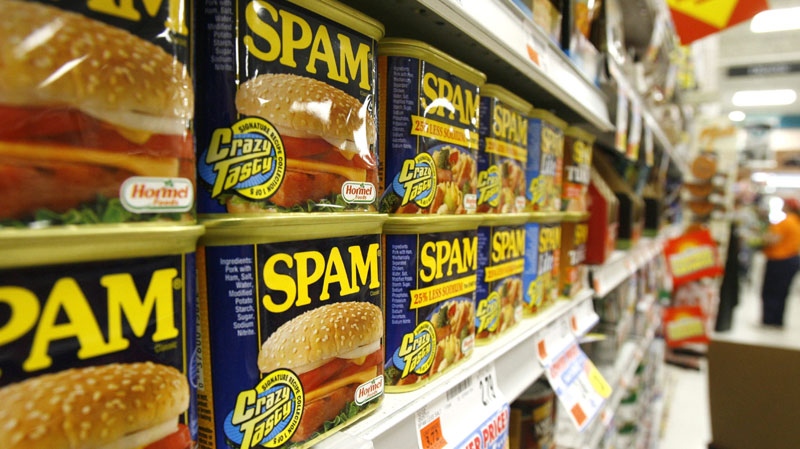In this May 27, 2008 file photo, cans of Spam line the shelves at a store in Berlin, Vt. (AP Photo/Toby Talbot, file)