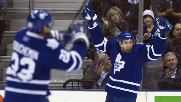 Toronto Maple Leafs forward Nikolai Kulemin, right, celebrates his goal against the Dallas Stars during first period NHL hockey action in Toronto on Monday, November 22, 2010. THE CANADIAN PRESS/Nathan Denette