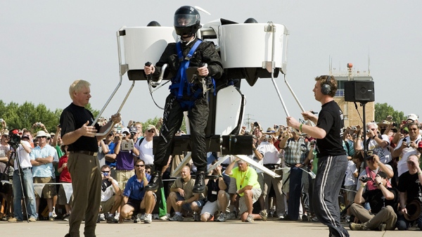 Harrison Martin takes a jet pack for a test flight at the annual EAA Airventure Fly-in Tuesday, July 29, 2008, in Oshkosh, Wis. (AP Photo/Morry Gash)
