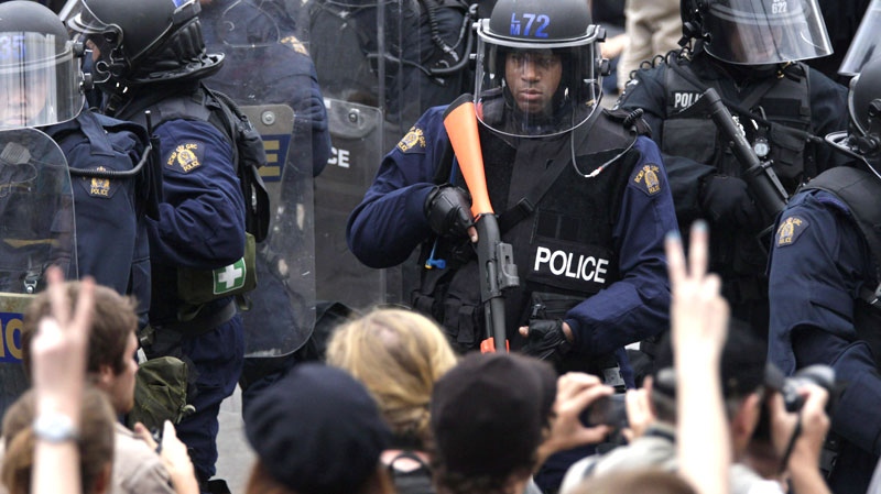 Riot police surround a large street demonstration on the closing day of the G20 Summit in Toronto, Sunday, June 27, 2010. (AP / Carolyn Kaster)