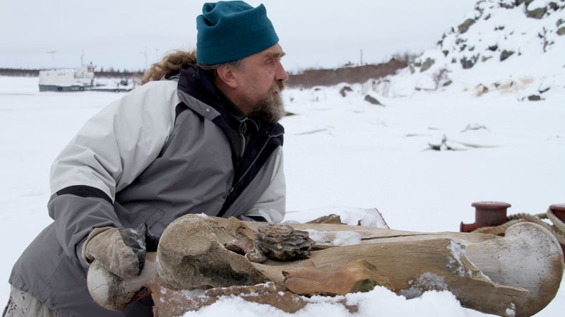 Russian scientist Sergey Zimov talks about mammoth bones he has collected in this remote area of northeast Siberia, Oct. 23, 2010. (AP / Arthur Max)