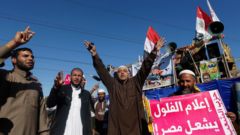 Islamist protesters chant slogans
