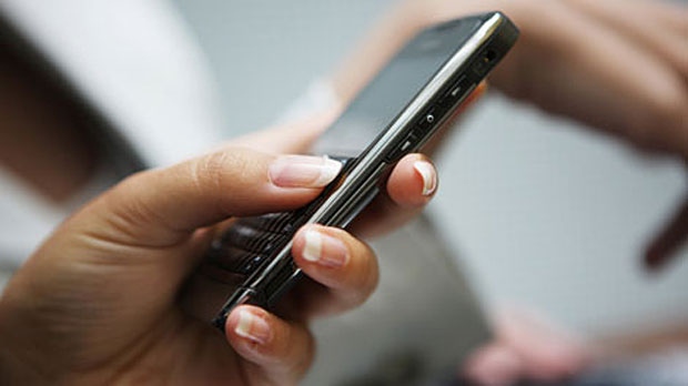 Using your cell phone number, fraudsters can take control of your online identity. (File Photo)