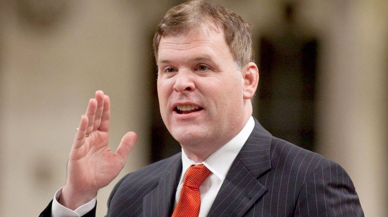 Government House leader John Baird gestures as he speaks during Question Period on Parliament Hill in Ottawa on Friday, Nov. 26, 2010. (Pawel Dwulit / THE CANADIAN PRESS)