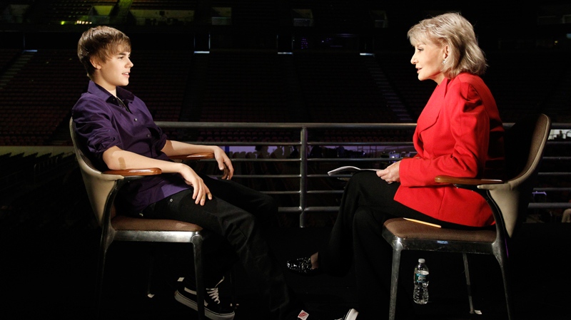 In this publicity image released by U.S. broadcast television network ABC, Barbara Walters is shown with Canadian pop sensation Justin Bieber during an interview for 'Barbara Walters Presents: The 10 Most Fascinating People of 2010.'