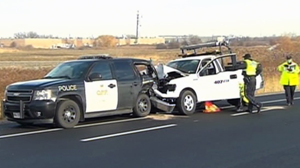A 407 service truck smashed into the back of a OPP SUV on a Highway 407 off-ramp on Monday, Nov. 29, 2010.