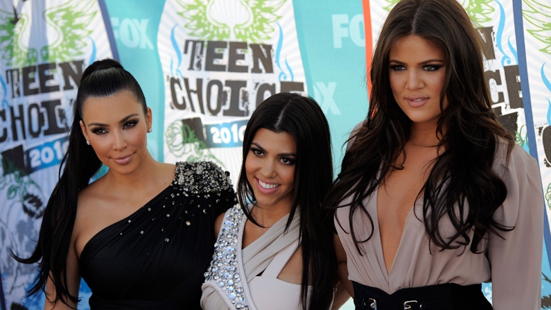 Kim Kardashian, Kourtney Kardashian and Khloe Kardashian arrive at the Teen Choice Awards in Universal City, Calif. Aug. 8, 2010. (AP / Chris Pizzello)