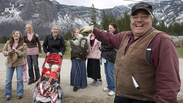 Winston Blackmore the religious leader of the polygamous community of Bountiful, B.C. shares a laugh with six of his daughters and some of his grandchildren, in this April 21, 2008 photo. (THE CANADIAN PRESS/Jonathan Hayward)