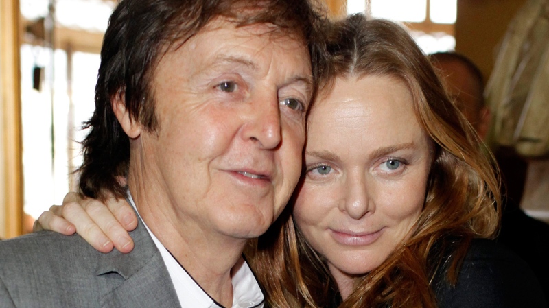Paul McCartney poses with his daughter Stella, at the Stella McCartney's spring-summer 2011 ready to wear fashion collection show, presented in Paris, Monday, Oct. 4, 2010. (AP / Thibault Camus)