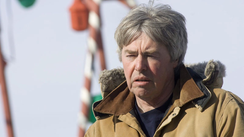 Robert Latimer speaks with media near a playset at his family farm in Wilkie, SK on Saturday, Mar. 15, 2008. (Geoff Howe / THE CANADIAN PRESS)