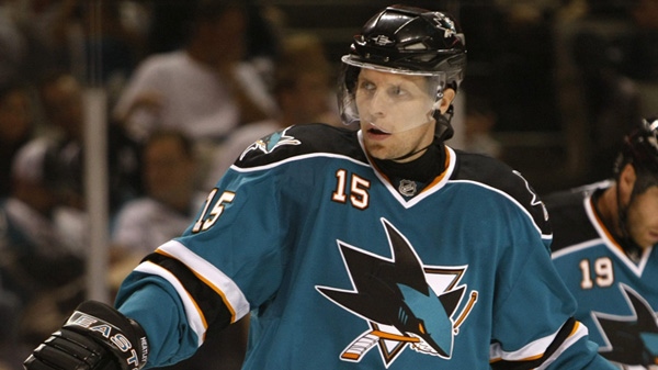 San Jose Sharks right wing Dany Heatley, left, skates next to Joe Thornton during the first period of an NHL preseason hockey game against the Phoenix Coyotes in San Jose, Calif., Saturday, Sept. 19, 2009. (AP Photo/Marcio Jose Sanchez)