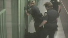 Special Const. Melanie Morris (left) is seen kicking a homeless man who was dragged into a prison cell.