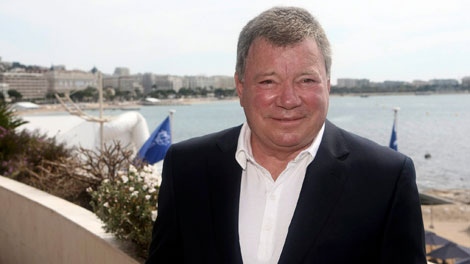 Canadian actor William Shatner poses for photographers during the MIPTV, International Television Programme Market, Monday, April 12, 2010, in Cannes, southern France. Science fiction legend Shatner announces at MIPTV the launch of "Weird or What?", the new Cinefilix science program. (AP Photo/Lionel Cironneau)
