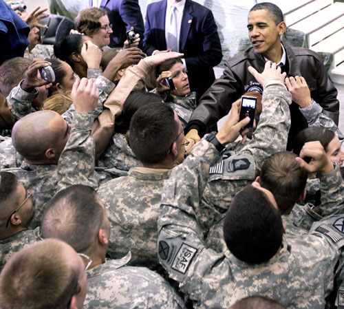 U.S. President Barack Obama greets troops at a rally during an unannounced visit at Bagram Air Field in Afghanistan, Friday, Dec. 3, 2010. (AP / Pablo Martinez Monsivais)