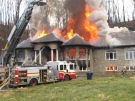 Flames rip through this home on Regional Road 174 in Cumberland, Friday, Dec. 3, 2010. Photo courtesy: Ottawa Fire Services