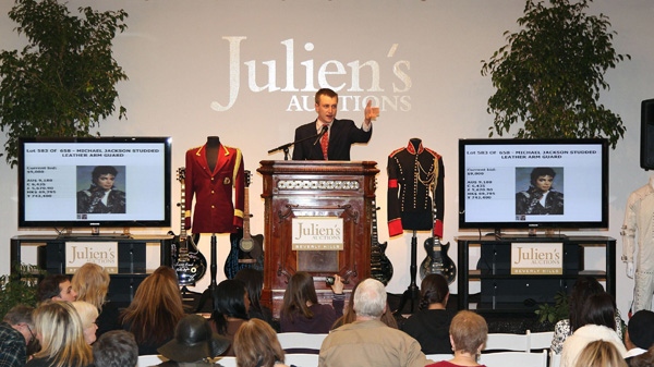 Auctioneer Michael Doyle auctions Michael Jackson memorabilia at the "Icons and Idols" at Julien's Auctions in Beverly Hills, in this photo provided by Julien�s Auctions dated Saturday Dec. 4, 2010. (Julien's Auctions / Shaan Kokin)