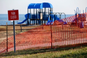 A recreational area is fenced off in an area where high levels of lead were recorded following Superstorm Sandy in Laurence Harbor, N.J., Thursday, Dec. 13, 2012. (AP / Julio Cortez)